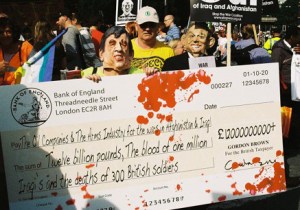 Audrey White, Stop the War campaigner, wearing the Gordon Brown facemask which the police forcibly removed.