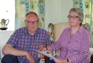 Picture of Duncan and Pamela Boxford-White, holding the apology letter from Wiltshire Police in this unlawful arrest claim for an alleged Breach of the Peace.