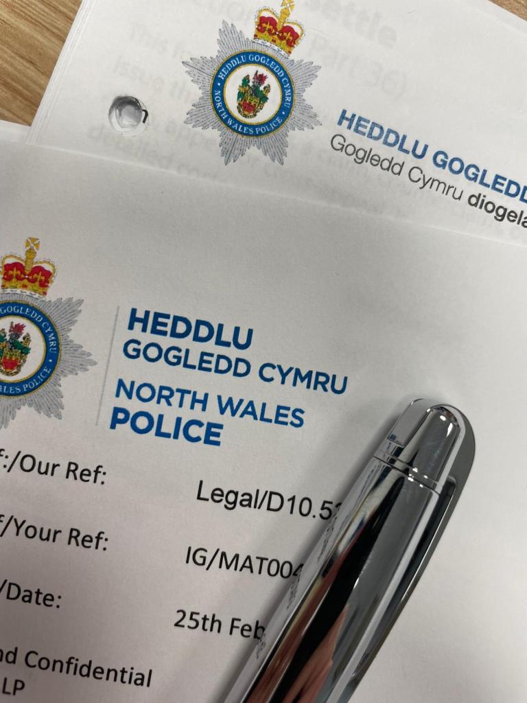 Photo of letters from North Wales Police.