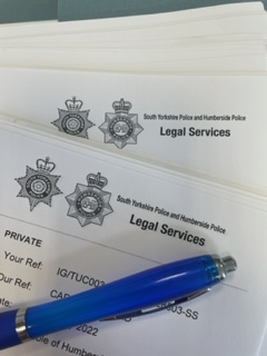 Photo of letters from South Yorkshire Police and Humberside Police Legal Services Department.